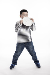 boy(kid) hand hold a empty dish isolated on the white background.