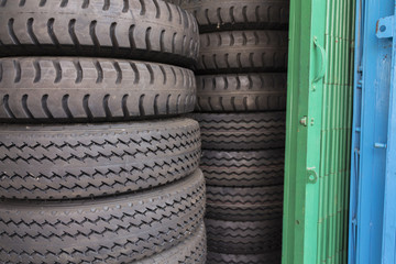 Tire rubber products , Group of new tires for sale at a tire store.