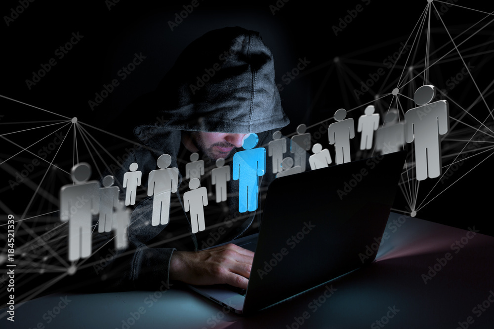 Poster hacker man in the dark using computer to hack data and information system