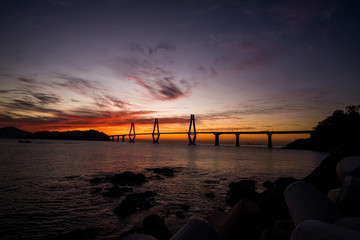 Sunrise through the Geoje Bridge