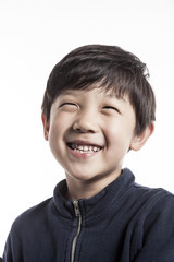 boy(kid) portrait with big smile isolated on the white background.