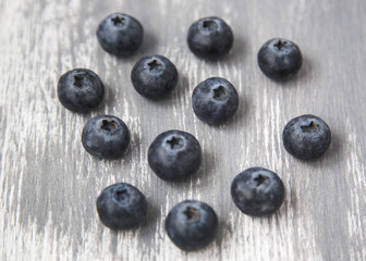 Fresh and Organic Blueberries Scattered on Wooden Background Natural Light Selective Focus