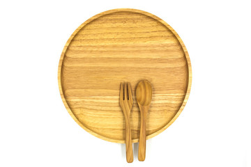 Wooden plate,spoon and fork isolated on white background.