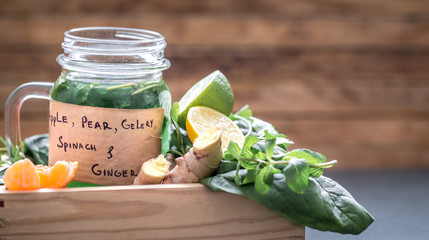 freshly fruit juice on a wooden background