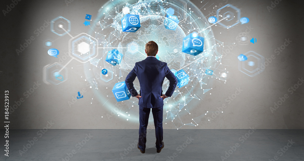 Poster Businessman using digital planet earth interface on a wall 3D rendering