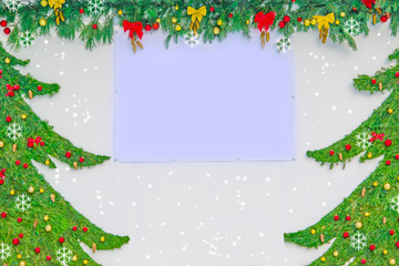 Christmas and new year background. Natural fir branches with toys and decorations on the wall with empty place for text, mock up
