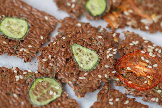 Crispy vegetable flax crispbread with sesame seeds and herbs.