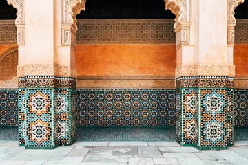 Gordijnen colorful ornamental tiles at moroccan courtyard © jon_chica