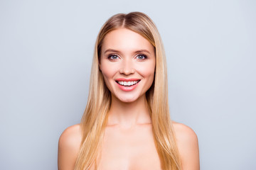 I'm in favour of natural beauty! Close up portrait of happy woman with perfect beaming smile, clean skin and healthy long hair