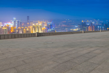 Road pavement and city skyline