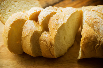 White bread on a white towel with milk