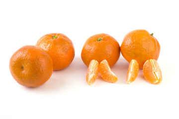 fresh mandarines isolated on white background. Oranges are arranged in rows. Placed on a white background.