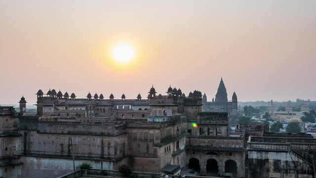Time lapse at Orchha Palace, hindu temple, cityscape at sunset, Madhya Pradesh. Also spelled Orcha, famous travel destination in India.