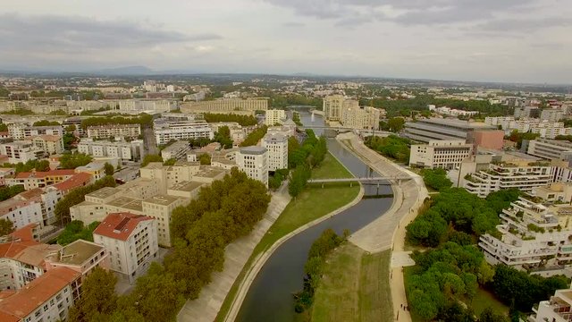 Descending aerial shot over the River Lez in Montpellier