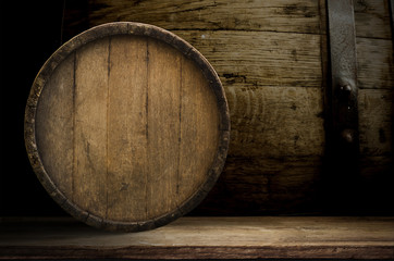 background barrel and worn old table of wood