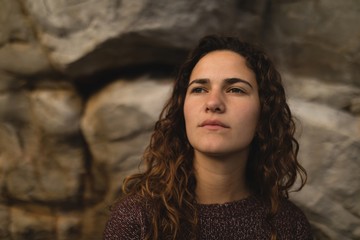 Female hiker relaxing during mountaineering