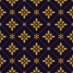 Gold and white snowflakes seamless pattern on black background