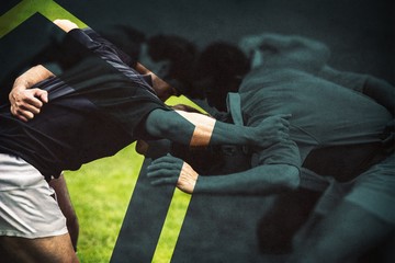 Rugby players making scrum