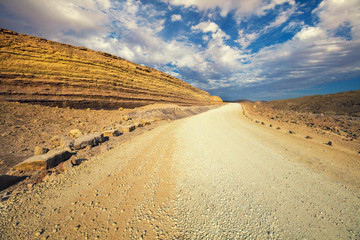 Dirt road in Makhtesh Ramon Crater, Negev desert, Israel
