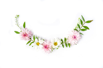 Semicircle Frame of chamomiles, branches, leaves and lilac petals on white background. Flat lay, top view