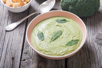 Cream soup with broccoli and baby spinach