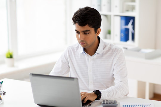 businessman with laptop working at office