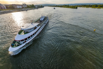 Passenger cruise ship on the Rhine river in Mainz, Germany on a summer evening. © bilanol