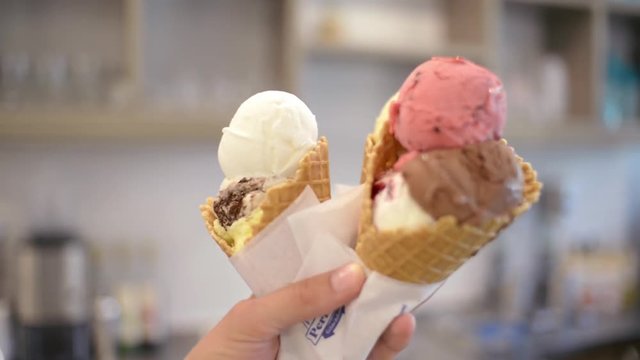 Ice cream Cones with Plomber, chocolate and fruity Scoops Gelato