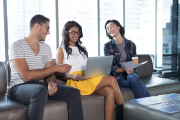 Executives working together in office