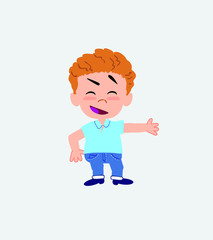 Blond boy in jeans showing something in an optimistic and positive attitude.