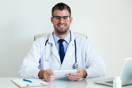 Confident Male Doctor In The Office Looking At Camera.