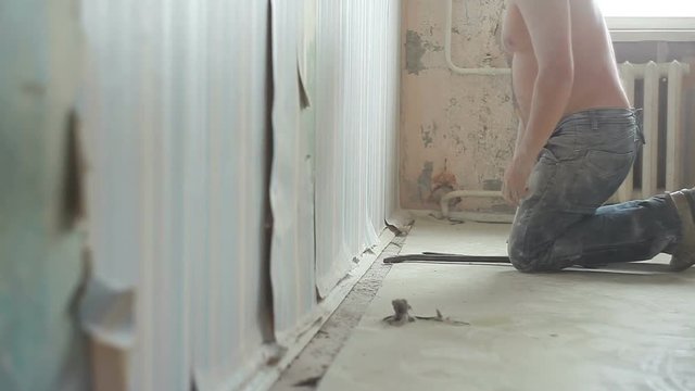 removes the old baseboard