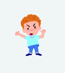 Blond boy in jeans argues something with a gesture of discontent.