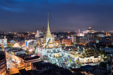 Cityscape at twilight time at Wattraimitr temple in the chinatown of Thailand