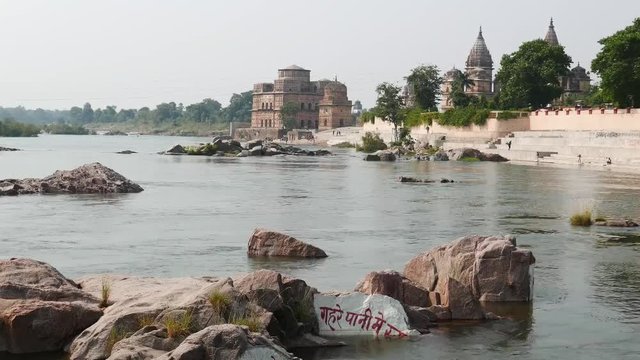 Cenotaphs at Orchha, Madhya Pradesh, famous travel destination in India. Holy Betwa river flowing.