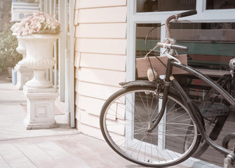 Fototapeta na wymiar Vintage bicycle resting in the street.