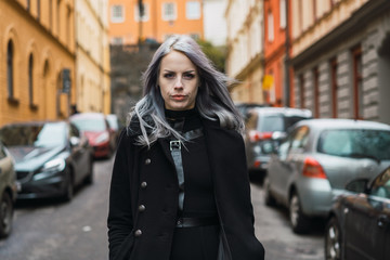 Stylish woman on cold street
