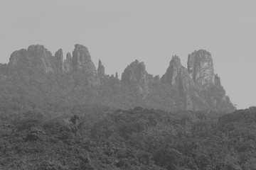 Fototapeta na wymiar Mountains and rainforest in Hot Springs National Forest Park in Hainan Qixianling - black and white