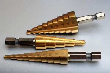 Set of unibits, or step drill bits