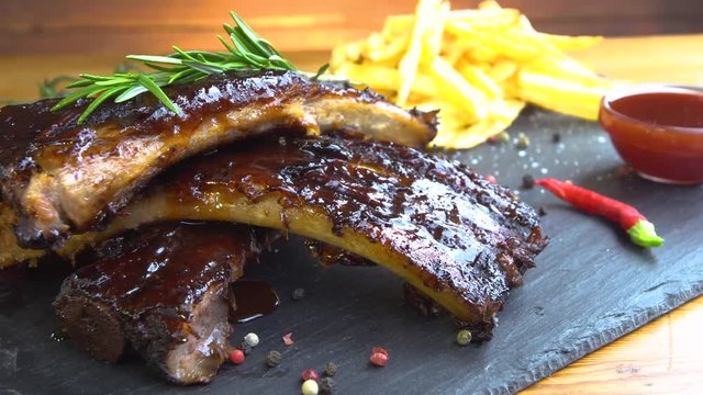 grilled bbq ribs on stone plate