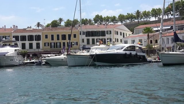 Super motor and sailing yachts in Marina