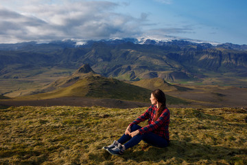 Naklejka premium Young woman Hiker in the mountains, alone with nature
