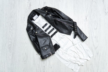 Fashionable concept. Black leather jacket and white t-shirt