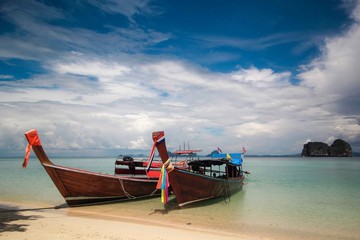 longtale boat on the white beach
