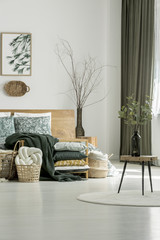 Wooden stool in olive bedroom