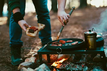 Fotobehang Old kettle, sausage in camping © sercansamanci