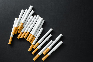 Cigarettes on a dark background.