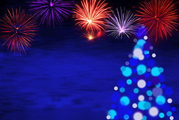 Obraz na płótnie Canvas Unfocused Christmas Tree with a Fireworks by Night
