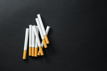 Cigarettes on a dark background.