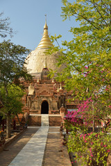 Old beautiful buddist temple located in colorful park, Myanmar (Burma)